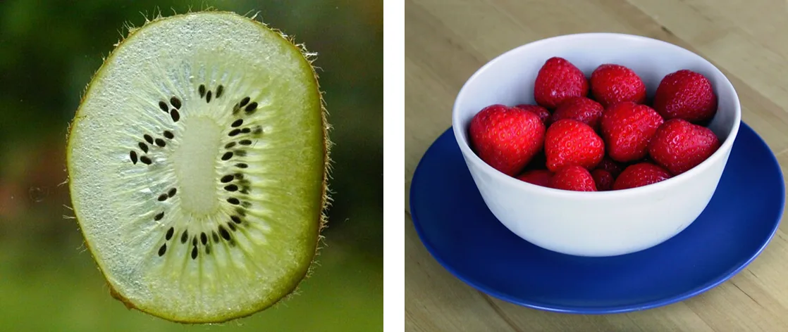 Two side-by-side photographs: a cross-section of a kiwifruit sliced in half, showing its green flesh, pale core, and ring of small black seeds, on the left; a white bowl of whole red strawberries on a blue plate, on the right.